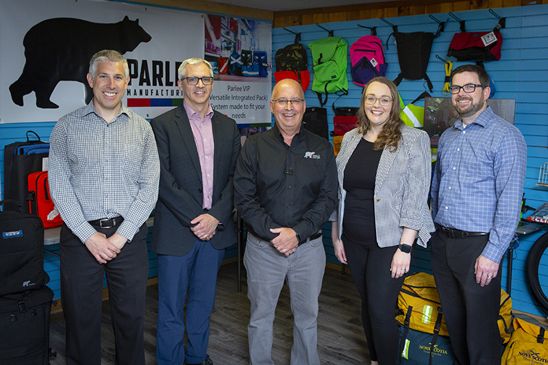 Glenn Parlee, owner of Parlee Manufacturing, with staff from NSBI