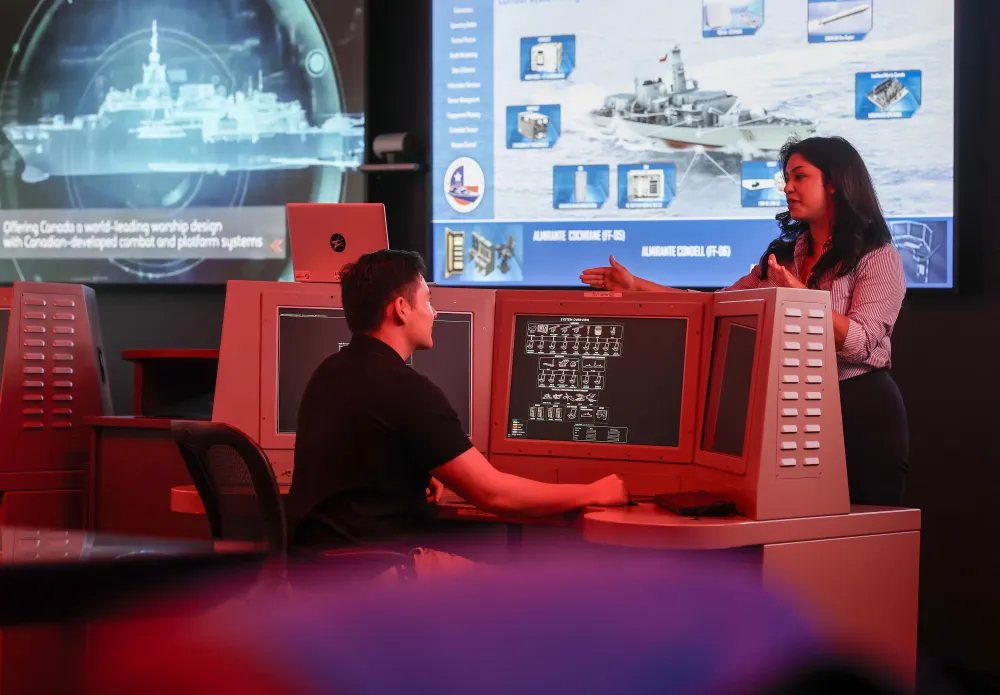 Two workers at Lockheed talking