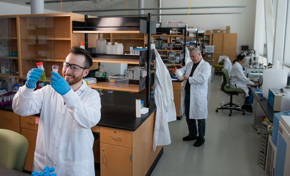 People working in a lab at the Verschuren Centre