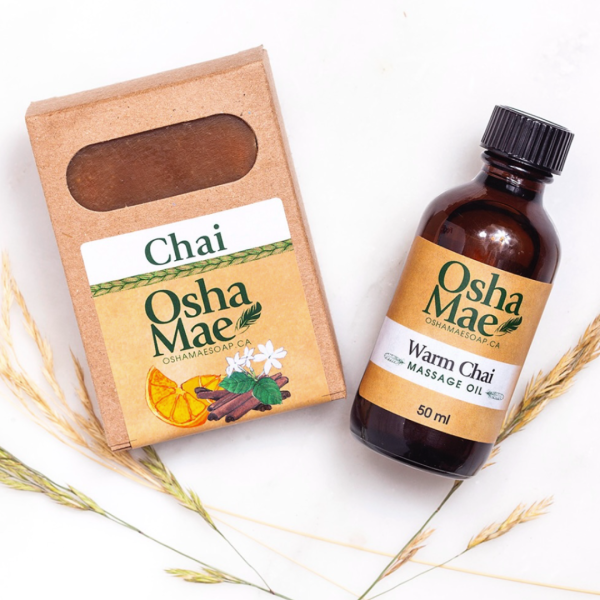 Soap and massage oil displayed with foliage