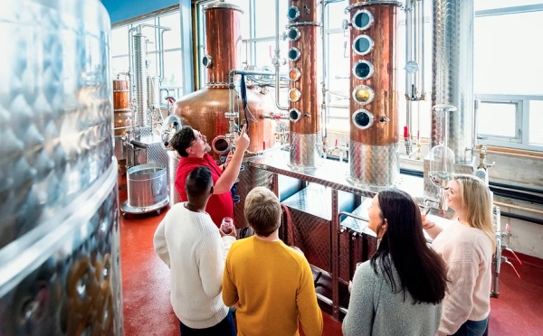 Group of people taste testing gin
