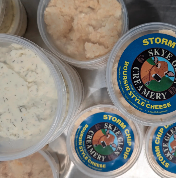 Plastic containers of boursin style cheese