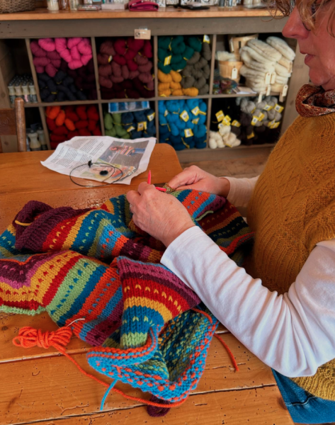 Woman knitting with wool