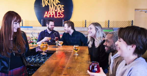 People at Chain Yard Cidery drinking cider