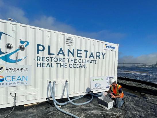Planetary Site Automation and Monitoring System pictured next to ocean.