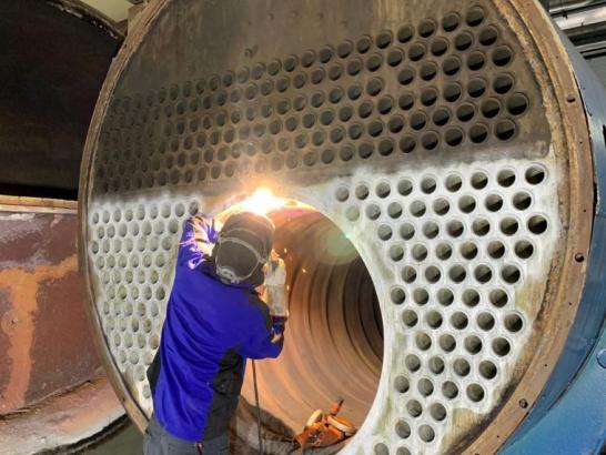 Man working on a boiler